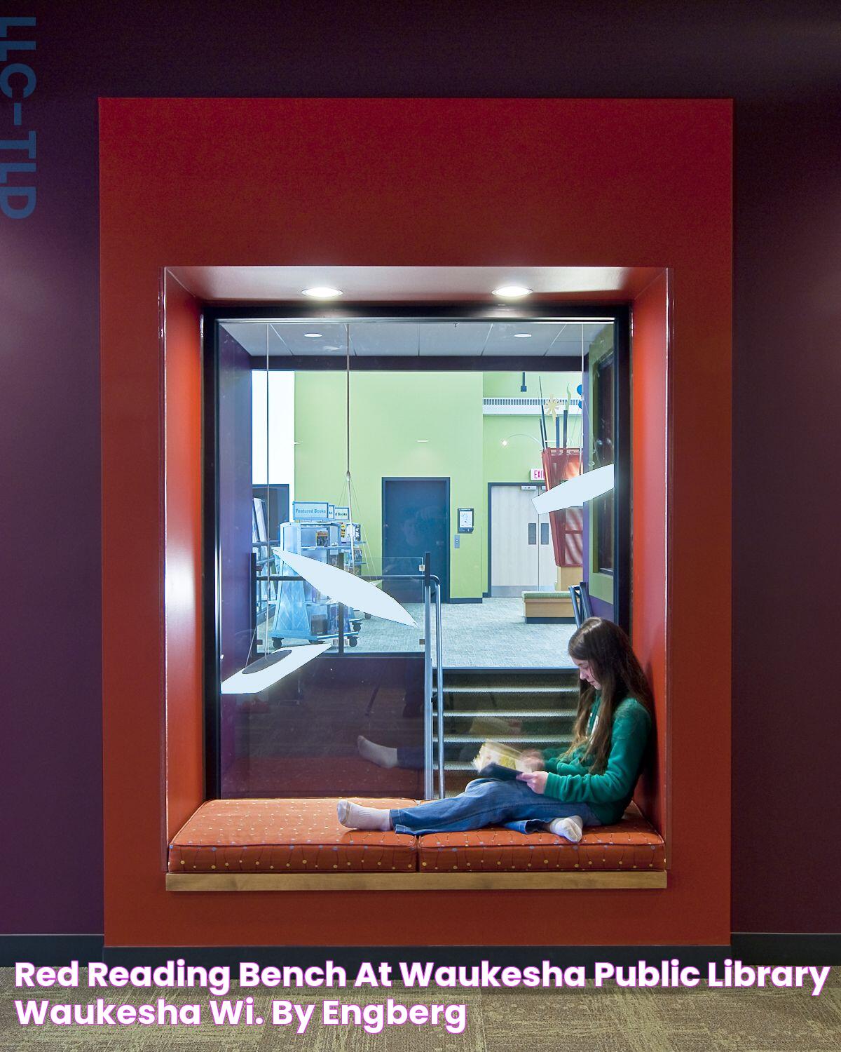 Red reading bench at Waukesha Public Library, Waukesha, WI. By Engberg